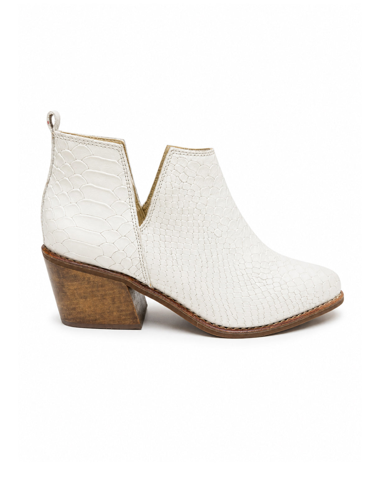 Botines Montevideo blanco hueso ideales para looks minimalistas y elegantes