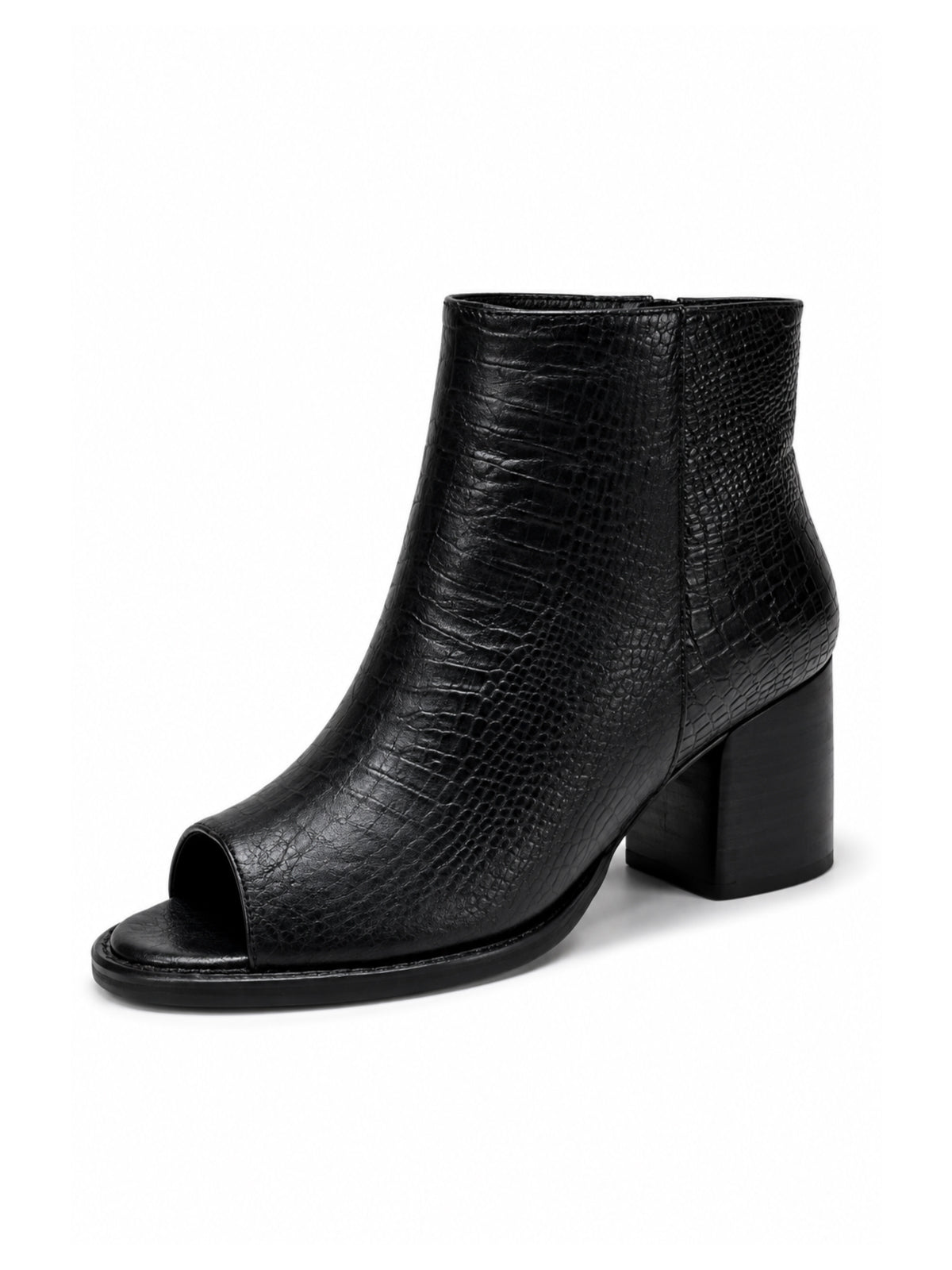 Botines negros de punta abierta ideales para looks urbanos, modernos y sofisticados