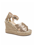 Plataformas Milagros doradas ideales para looks glamour, resort y ocasiones especiales