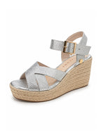 Sandalias de plataforma con suela de yute elaboradas en cuero tono aurora plata