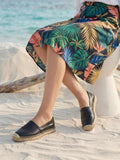 Spadrilas en cuero escama color negro con diseño elegante y urbano para mujer