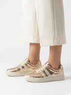 Tenis en cuero Houston dorado con estilo luxury urban para mujer